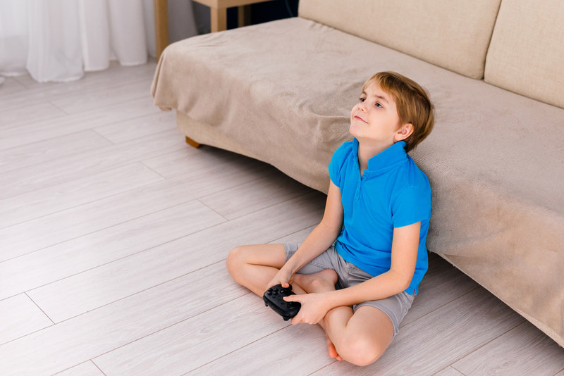 Boy Playing Alone