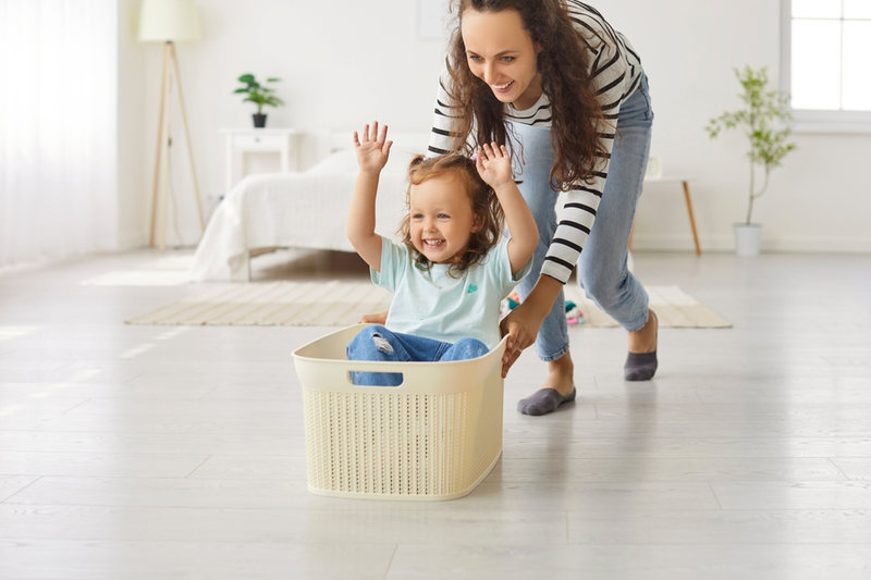 Mum playing with toddler